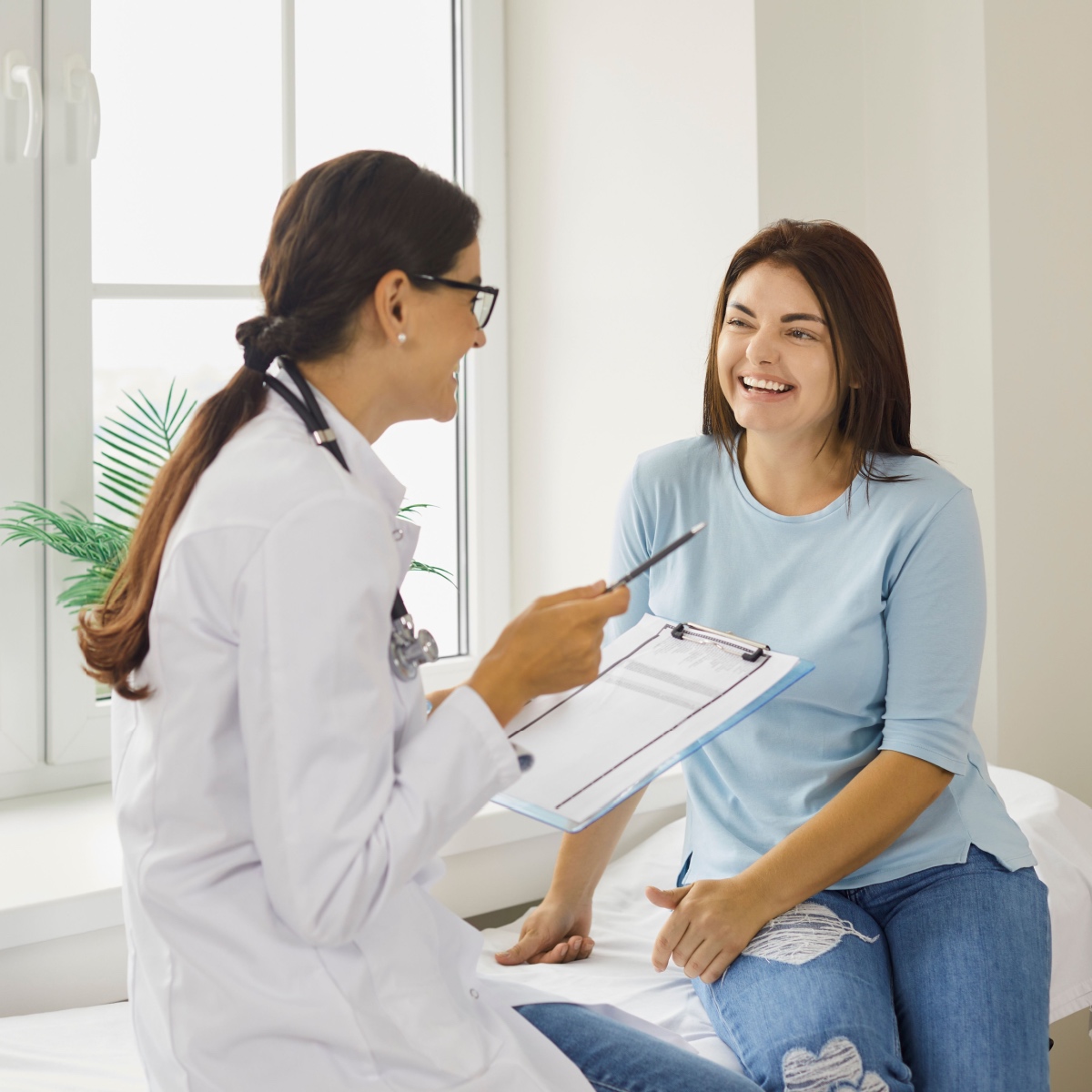 A gestational carrier talking to an IVF doctor